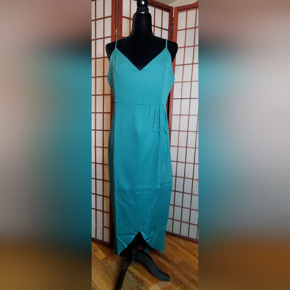 Dress: Spaghetti strapped, scarab cut tail
